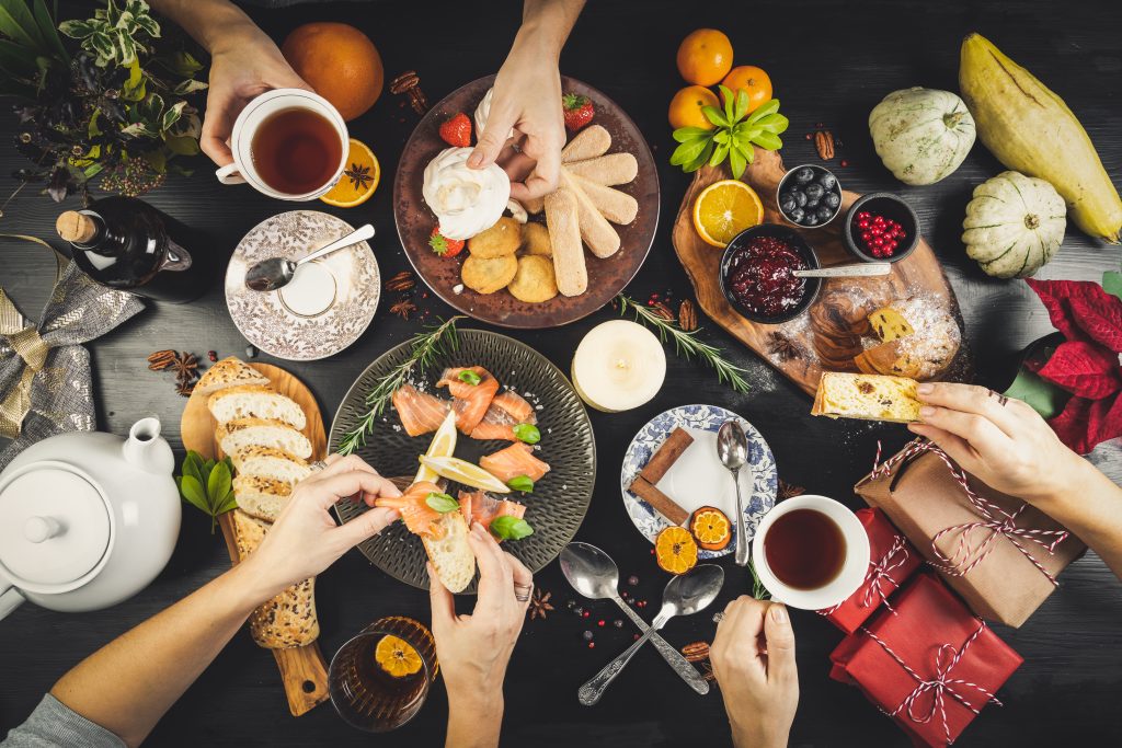 sharing christmas food table diet organic hands celebration home